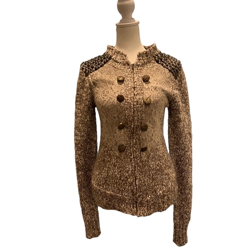 Beautiful  Boutique sweater size small with beads on the shoulders.